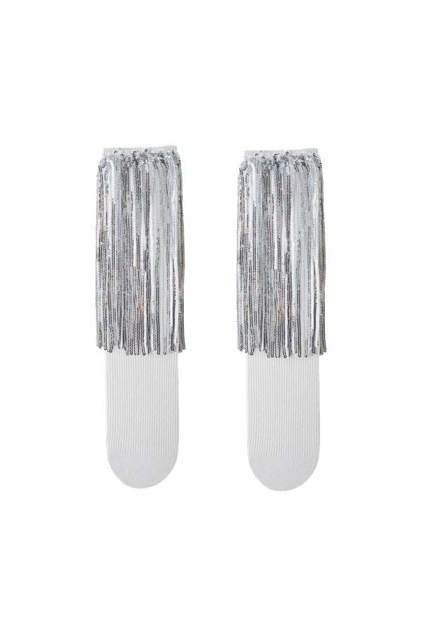 White knee-high socks for a girl with silver sequin tassels