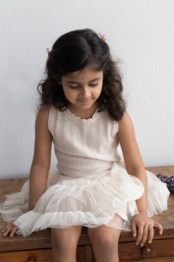 Top de tirantes rosa claro para niña y falda pantalón rosa claro para niña