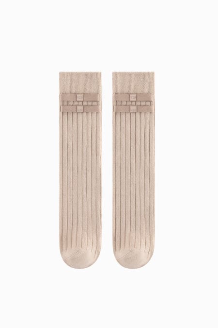 Cream knee-high socks for a girl