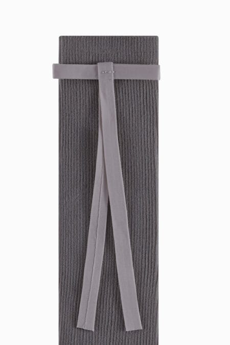 Grey seamless socks for a girl with a long grey bow