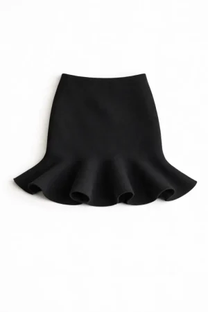 Black knit mermaid-cut skirt for girls with a flared hem design.