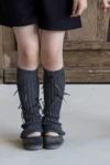 Grey leg warmers with bows