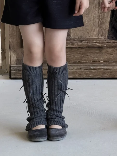 Grey leg warmers for girls with bows.