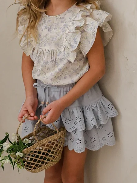Shorts in cotone celesti con ricamo traforato - Pantaloni corti