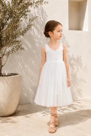 White girls' dress with a tulle skirt, ideal for warm days.