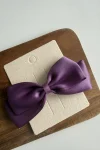 Fermaglio per capelli per bambina con fiocco viola