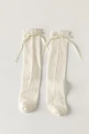 Calcetines hasta la rodilla color crema con lazos