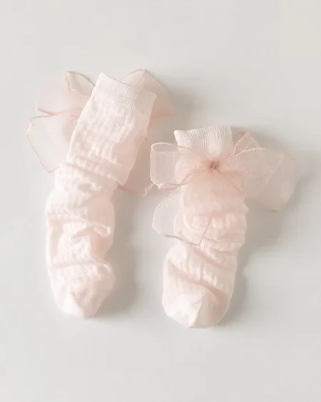 Calzini rosa chiaro con fiocchi in tulle, per bambina, morbidi e delicati.