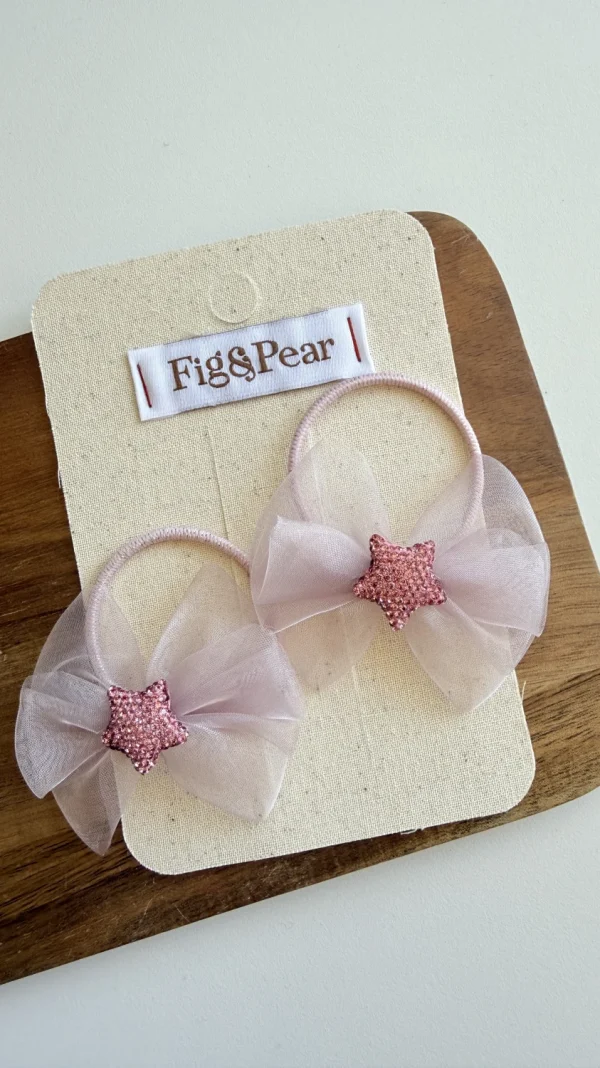 Pink tulle bows for girls, decorated with a glittery star.